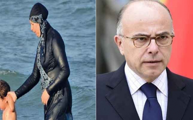 وزير الداخلية الفرنسي يحذر من "تداعيات قد يتعذر تداركها" في حال إقرار قانون يحظر "البوركيني"